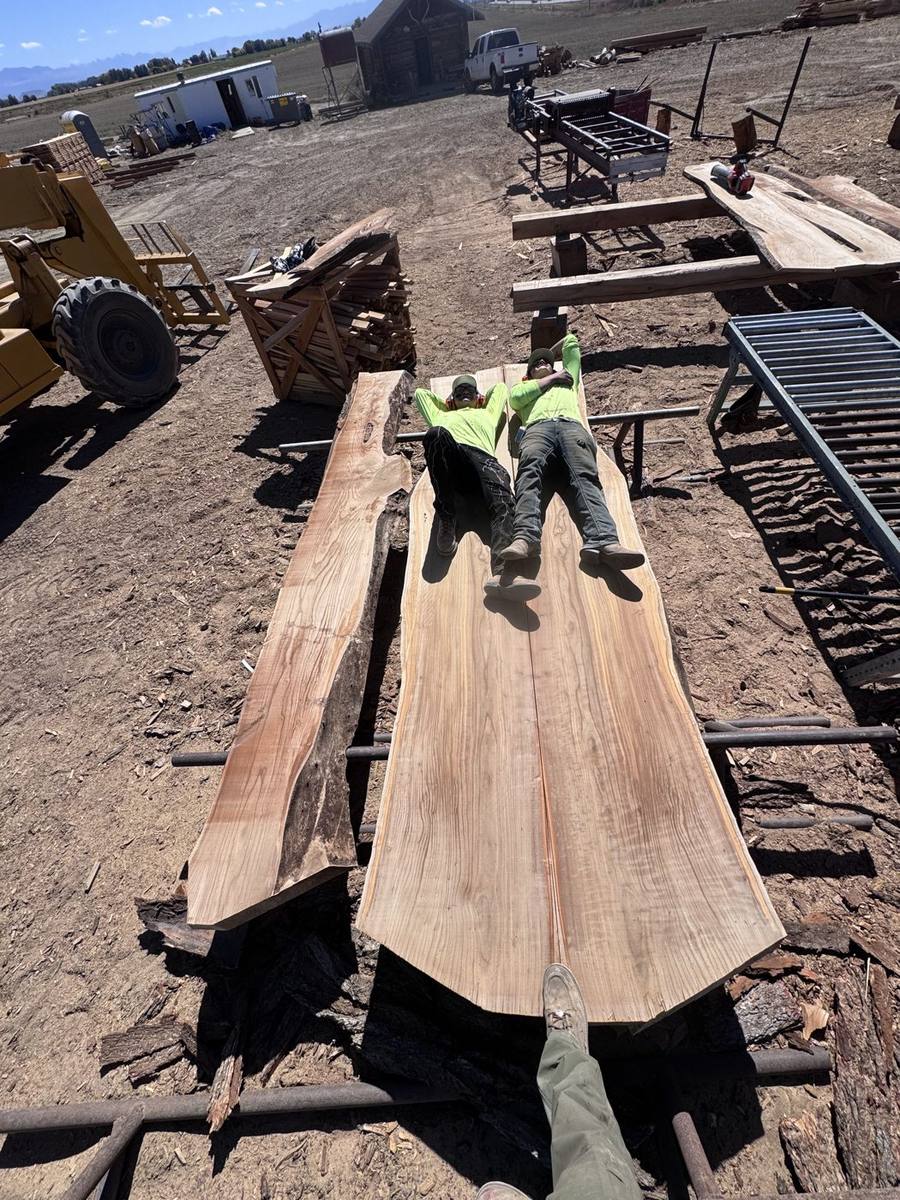 Crew lying on huge slabs for scale
