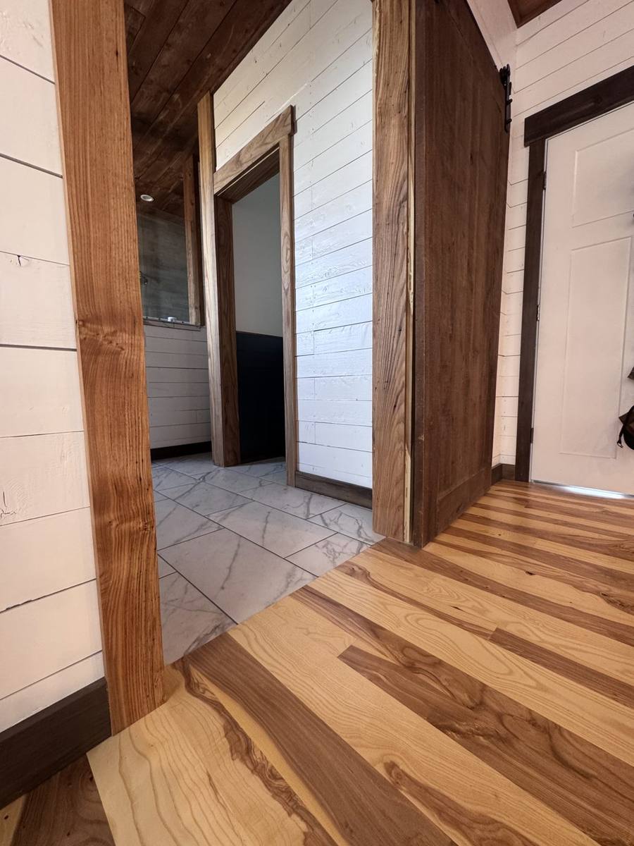 Interior with spruce walls, Doug fir trim and door, and ash floors